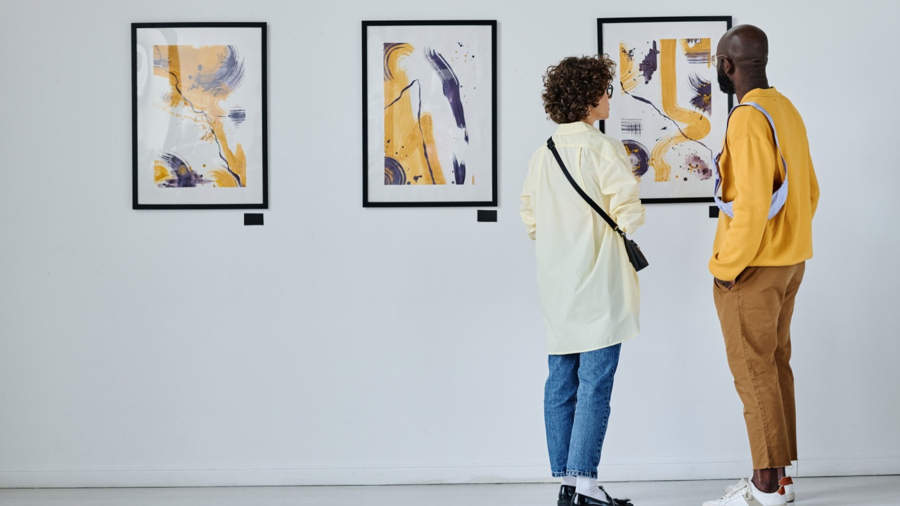 Young couple visiting art gallery