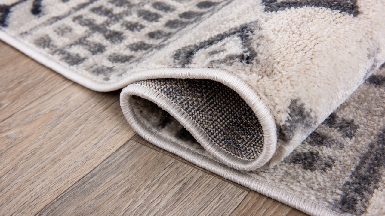 Detail of a specially designed carpet laid on the floor