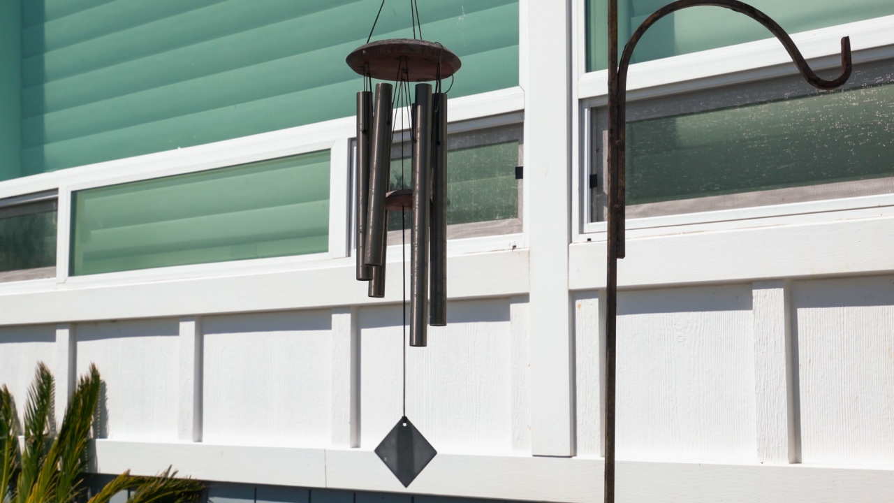 Garden bells wind chimes outdoor. Hanging home decore, close-up