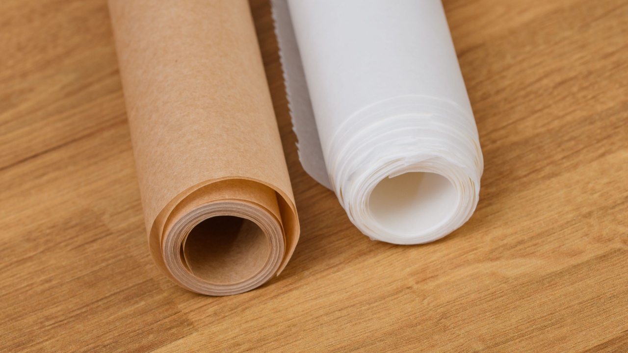 White and gray waxed baking paper in rolls