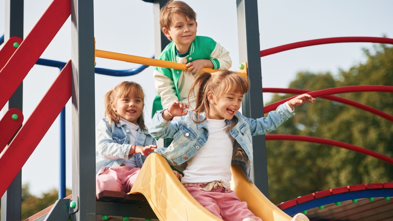 On the playground. Kids are having fun together.