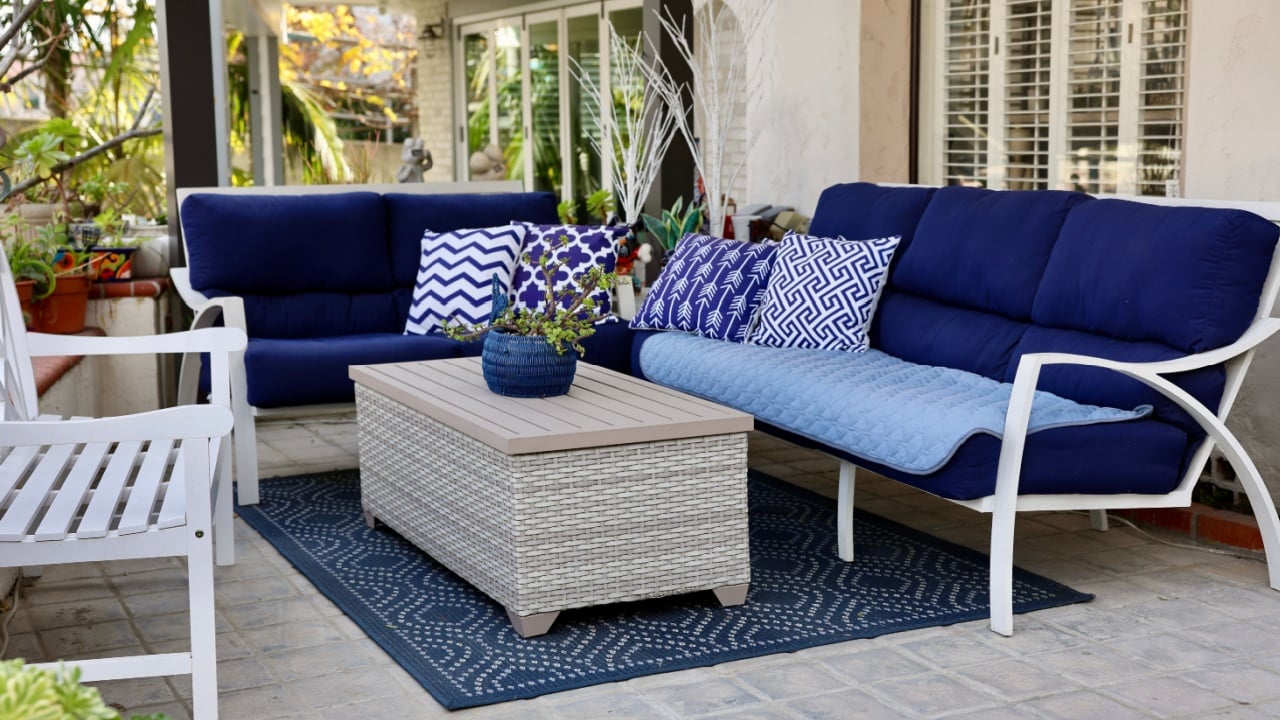 Lanai on the side of the building is filled with comfortable outdoor furniture