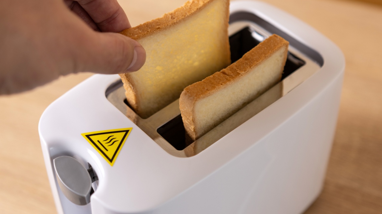 To make toast, bread is loaded into an electric 
