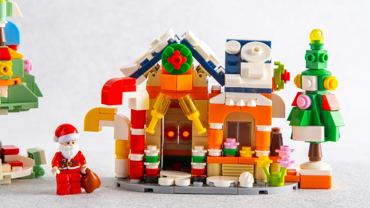 Christmas tree and Santa Claus house toy. Lego constructor from mini bricks. Children's craft. Game. Ukraine, Kyiv - January 17, 2024