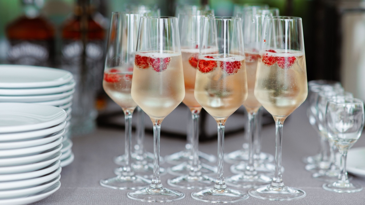 glasses champagne, welcome drink, wine glass, cocktail, with raspberry, Sparkling wine,celebrate a luxury party, Catering, party service,