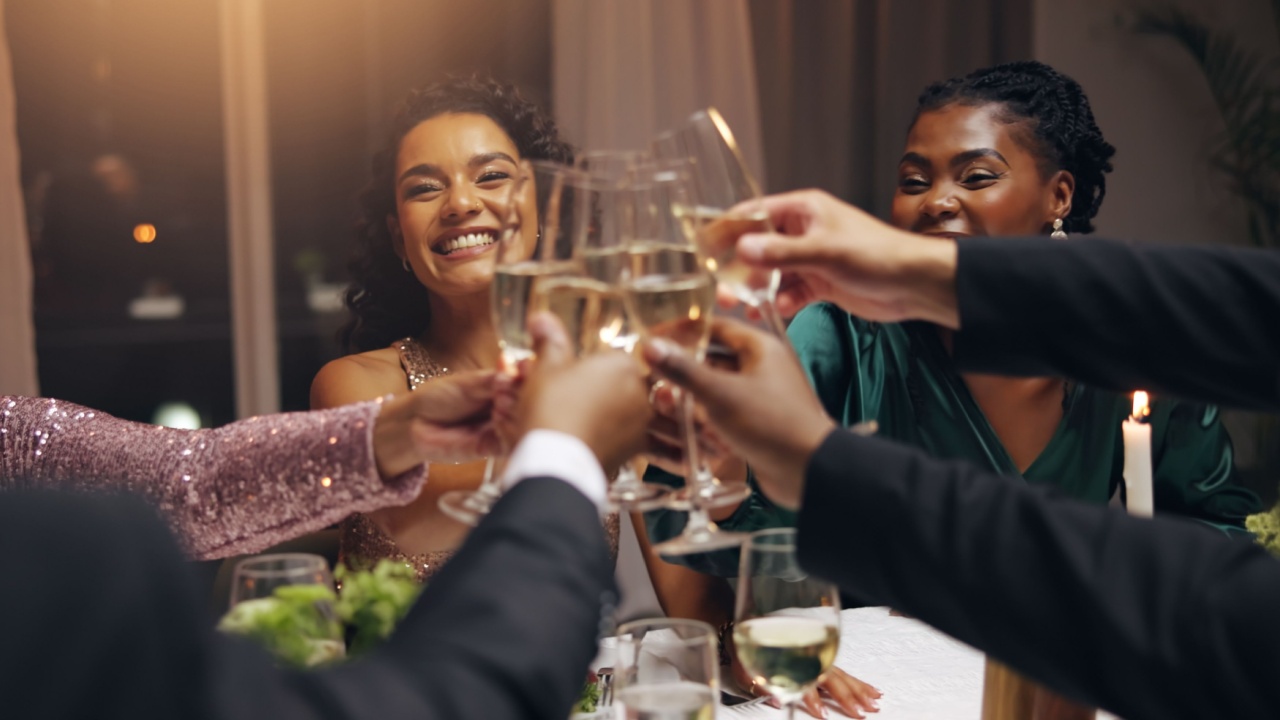 Business people, dinner and toast champagne at party in celebration, goal or diversity for success with smile at night. Team, drinks and alcohol for cheers, congratulations and new year at gala event