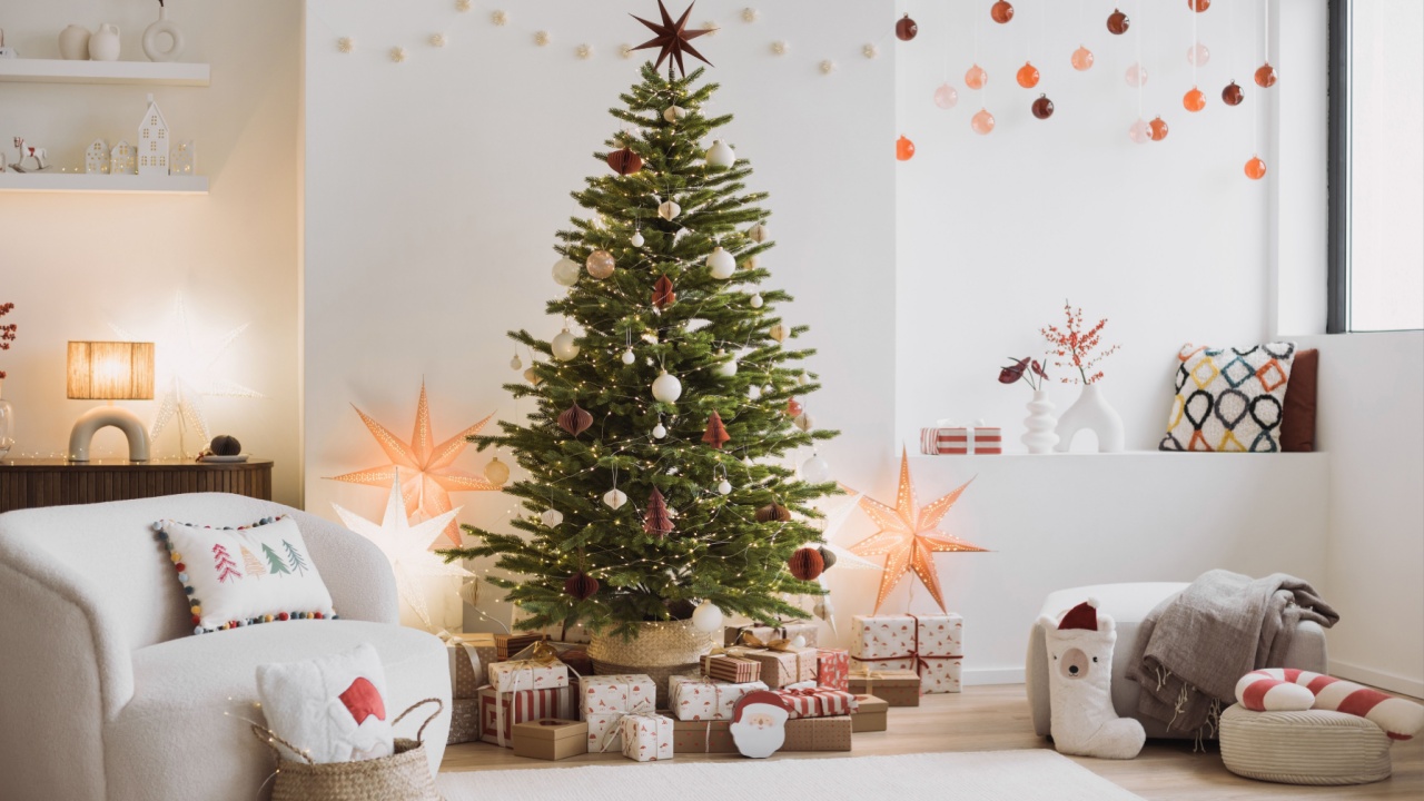 Stylish Christmas living room interior with sofa, christmas tree, stars, gifts and decoration