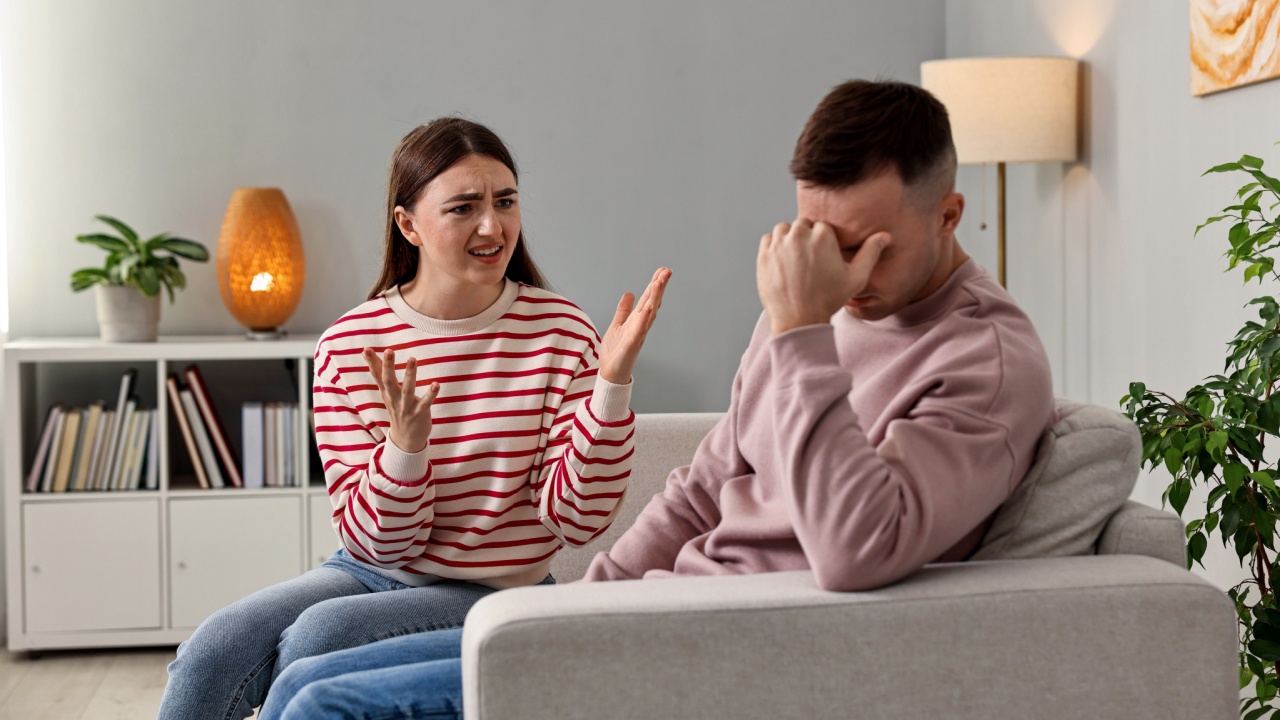 Husband ignoring his emotional wife at home