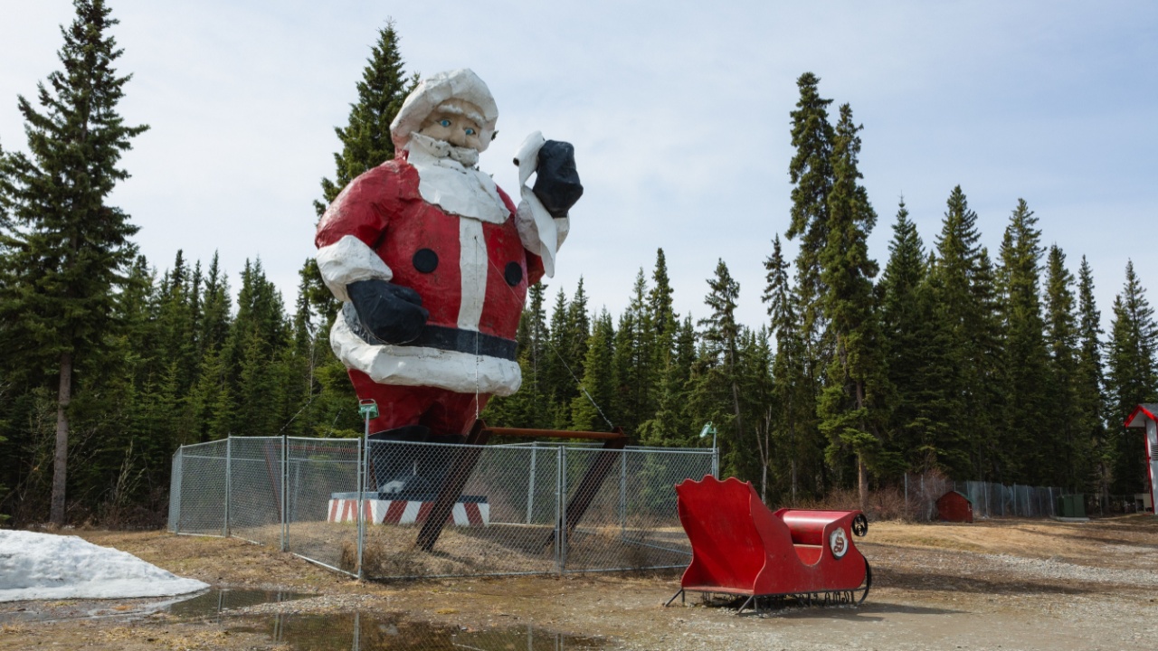 North Pole, Alaska - May 15, 2022: a massive Santa Claus statue and a sleigh. 