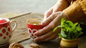 Tea party. Drinking herbal tea with mint.