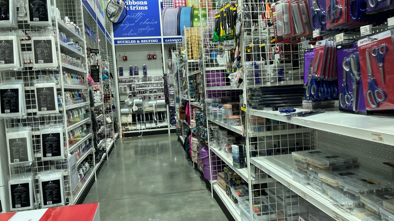 Melbourne, Victoria, Australia – 6 January 2025: Wide aisle in a craft and office supply store stocked with scissors, stationery, art tools, and frames. Perfect for creative projects, school prep, and