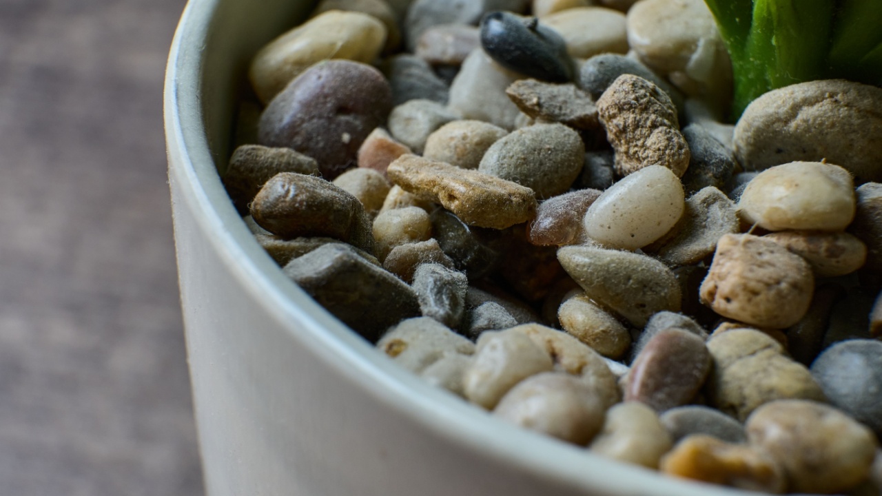 Close view of pebbles inside a decorative pot