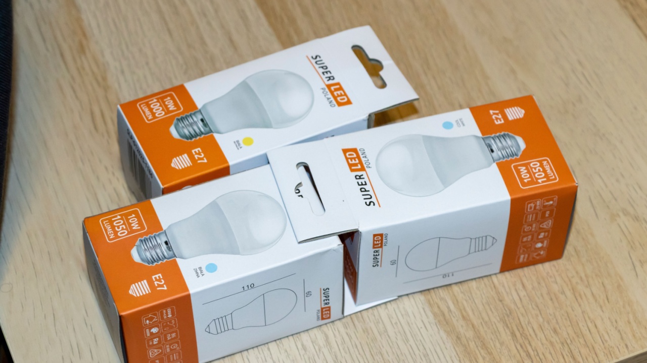 Warsaw, Poland - September 24, 2025: A collection of compact LED light bulb packages showcasing modern energy-efficient lighting solutions for home and commercial use.