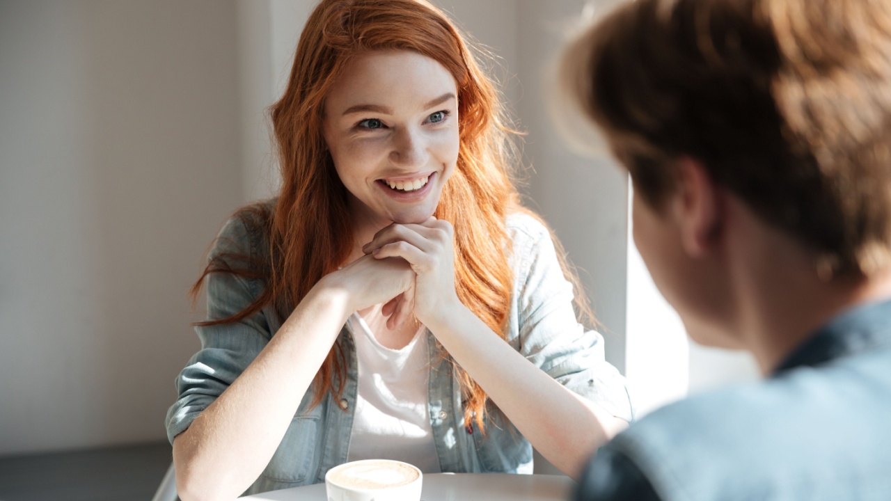 Young student woman listening her friend