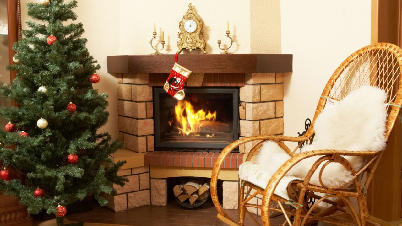 Image of house room with rocking-chair, Christmas tree, fireplace in it