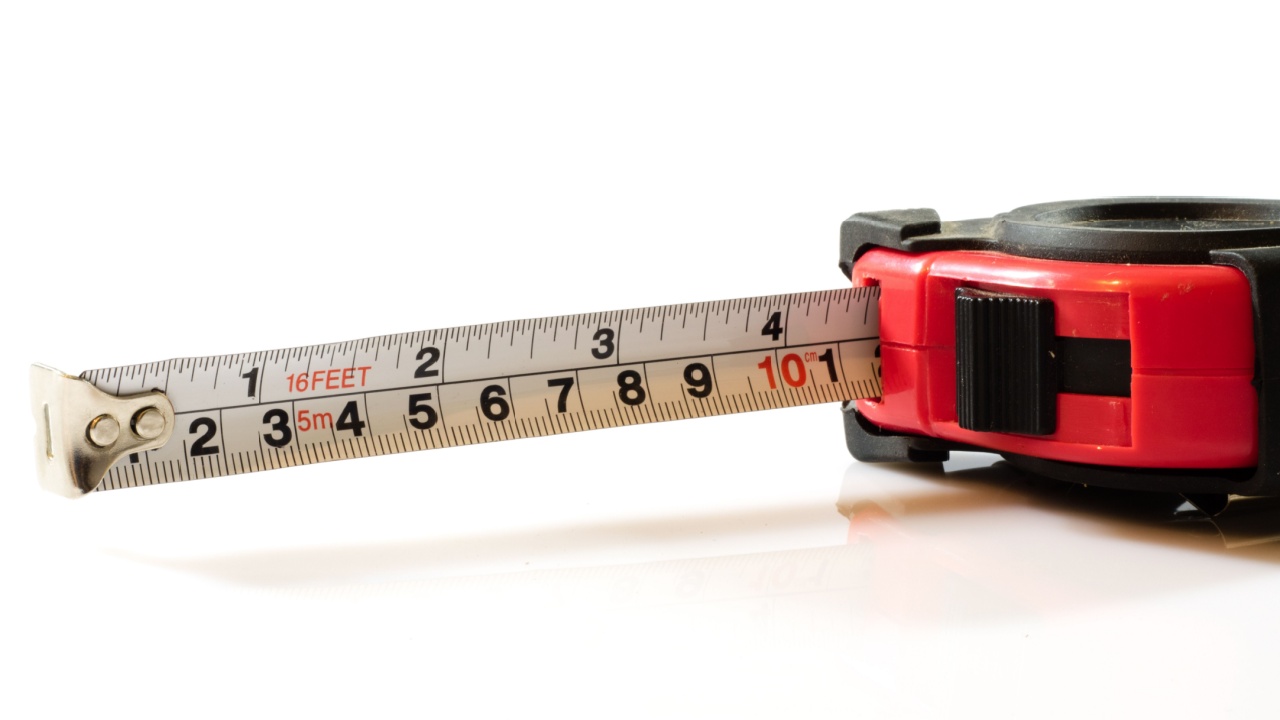 Measuring tape for masters on a white background, isolated