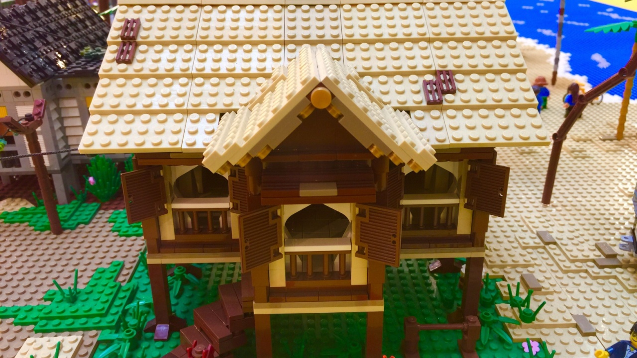 KUALA LUMPUR, MALAYSIA -JUN 20, 2017: Lego toy blocks arranged to form imaginary vacation beach village. Various characters and forms are gathered here.