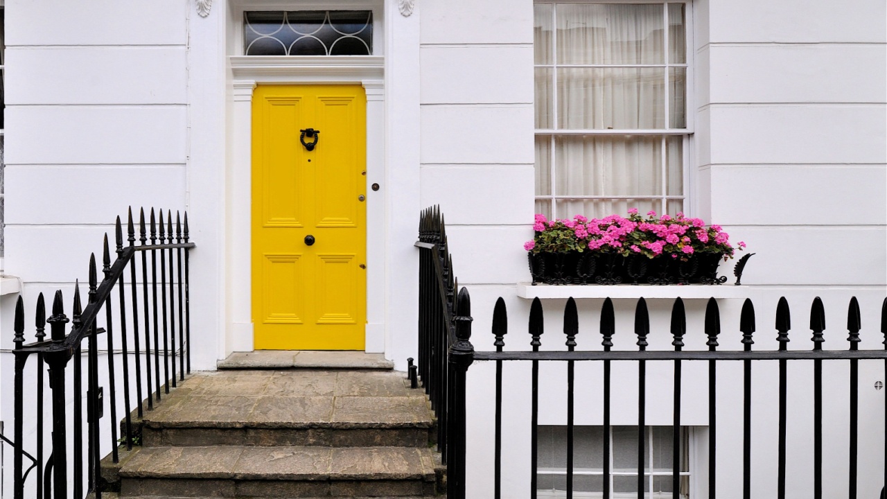 The raised ground floor entrance facade of an eighteenth century terraced townhouse on Tachbrook Street, Pimlico in the Victoria district of central London, UK.