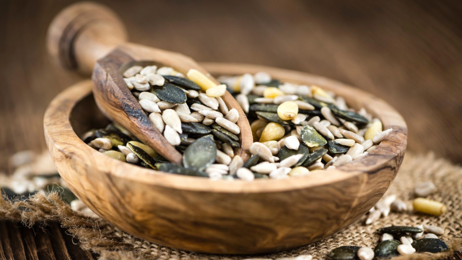 Mixed Seeds on wooden background