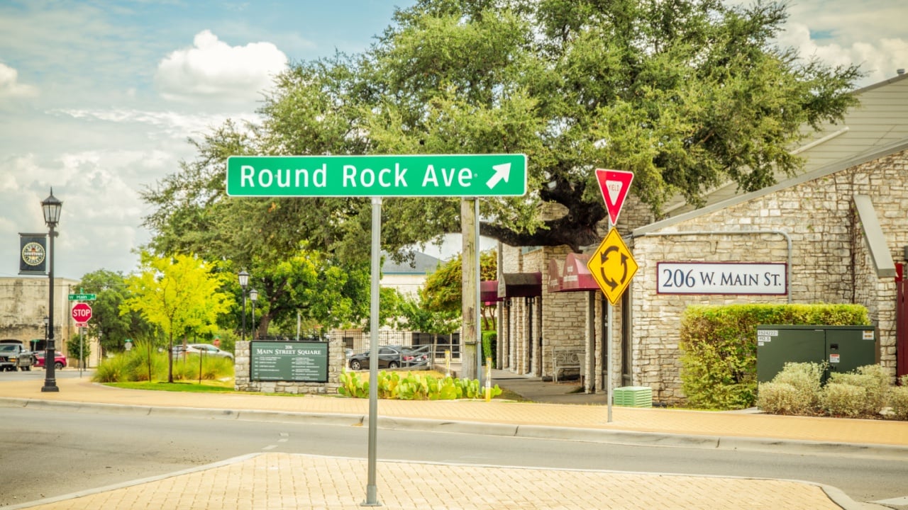Round Rock, Texas, USA-24 August 2019 : View of Round Rock in downtown, Texas. Bars, restaurants and other businesses in downtown square. With beautiful blue sky on a sunny day