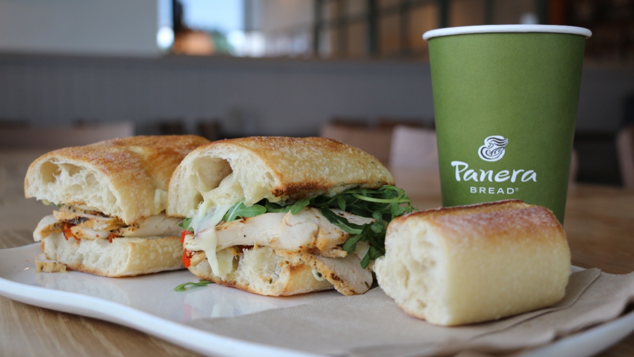 COLUMBUS, GEORGIA/USA - 06-20-2019 Tuscan Grilled Chicken Sandwich on a white plate at a Panera Bread restaurant in Columbus, GA.
