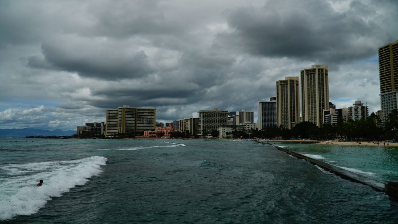 Waikiki, Honolulu, Hawaii, USA. October ‎11, ‎2019. Storm clouds over a city on a Hawaiian city in the Pacific Ocean.
