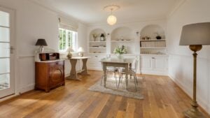 Stradishall, England - March 21 2016: Contemporary furnished modern dining room in white