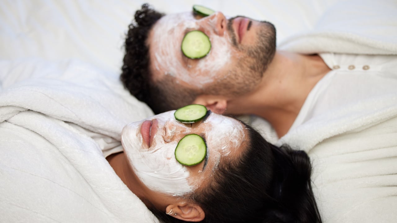 Today is our pamper day. a young couple having a spa day at home.
