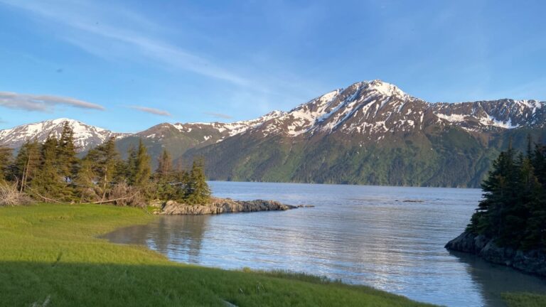 Kenai Lake (Dena'ina: Sqilan Bena) is a large, zig-zag shaped lake on the Kenai Peninsula, Alaska. The lake forms the headwaters of the Kenai River.