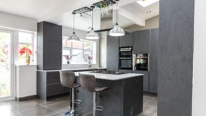 Beautiful grey slate and marble European style modern home kitchen. Elegant minimal home interior style decor. Luxury living standards at home.