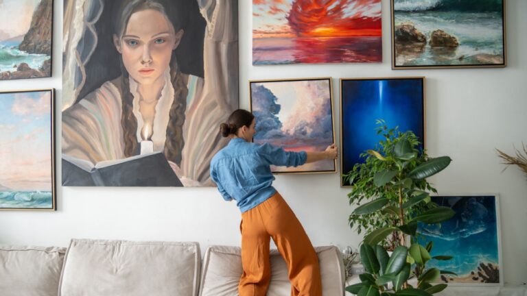 woman painter, hangs on wall trendy artwork, created handmade in art workshop.