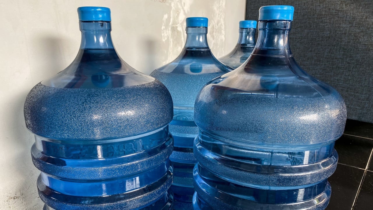 gallon mineral water filled with refill drinking water