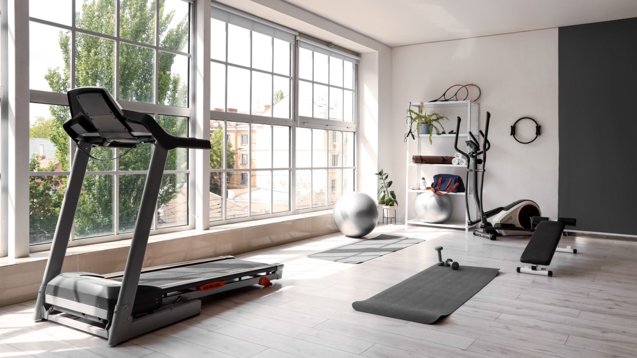 Interior of gym with modern sports equipment