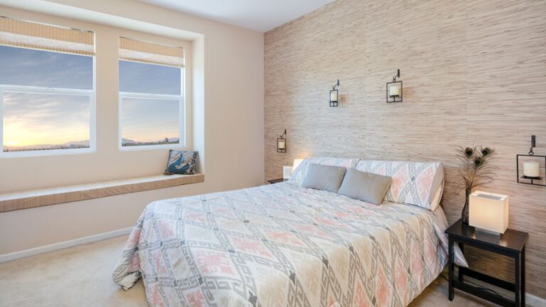 Beautiful bedroom with natural fibers wallpaper.
