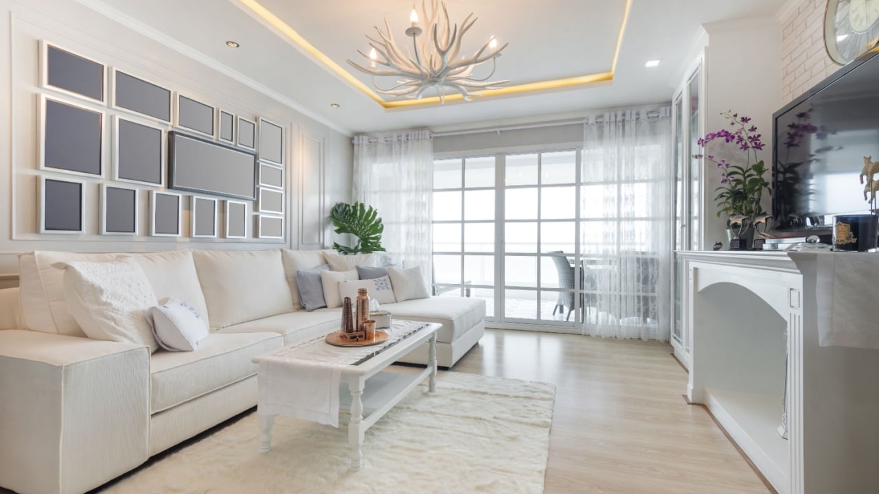 Renovation White Living Room The seaside ambience is decorated with fondness of all white tones.