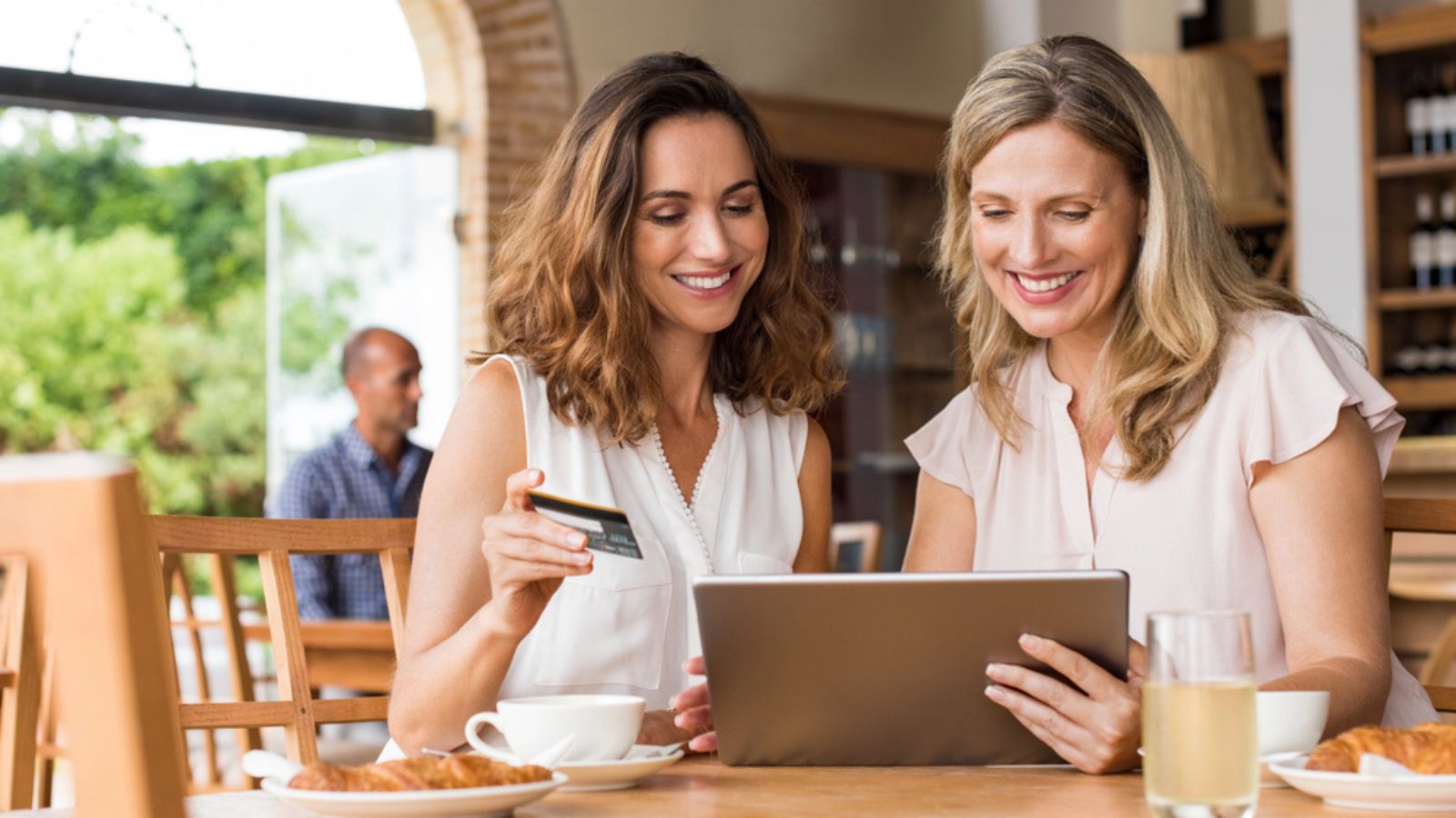 Women doing shopping online with credit card