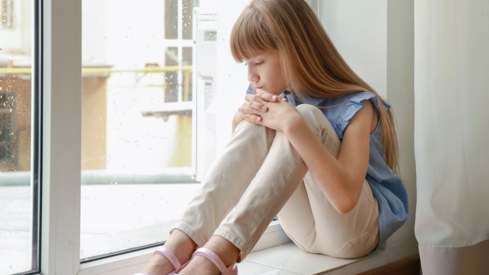 sad young child girl