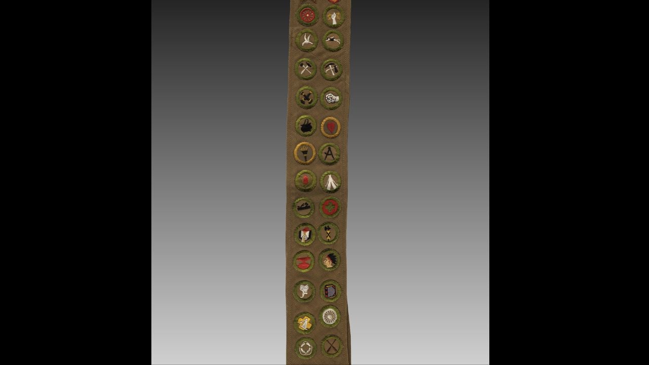 Boy Scouts of America Merit Badge sash owned and worn by Gerald R. Ford as a scout. It contains 26 merit badges and two rank advancements. Dates to the 1920s. Gift of Gerald R. Ford.