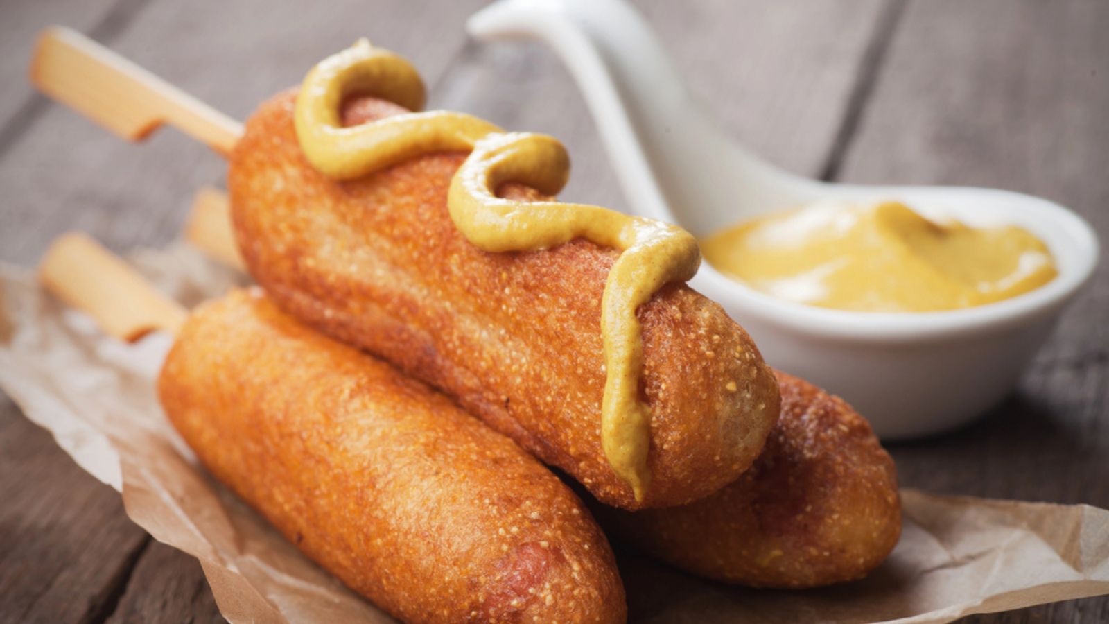 Corn dog with mustard