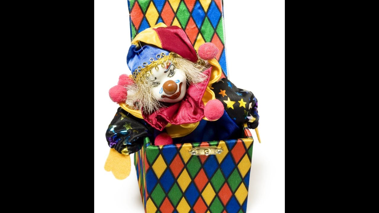 Jack-in-the-box toy isolated on white background