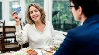 Business couple having dinner together