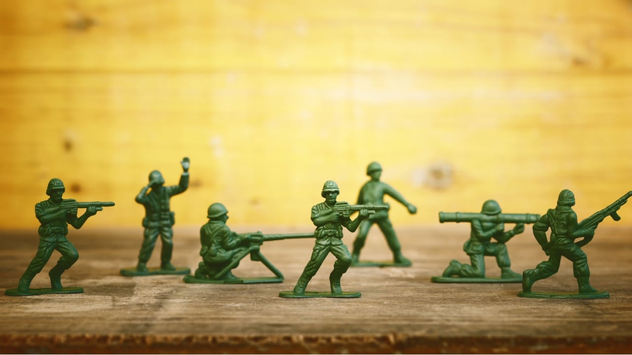 image of toy soldiers over wooden table