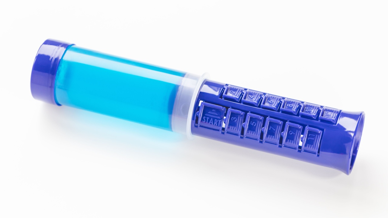 Fresh toilet cleaner gel on white background. Blue stamp wc cleaning dispenser