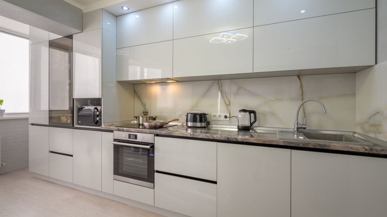 Interior of modern trendy white kitchen