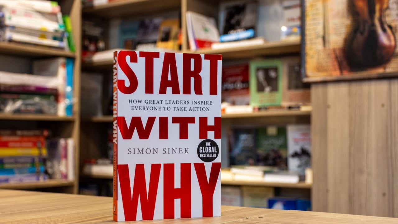 Setif, Algeria - May 20, 2023: Close-up of Simon Sinek's Start with Why book in the bookshop. 