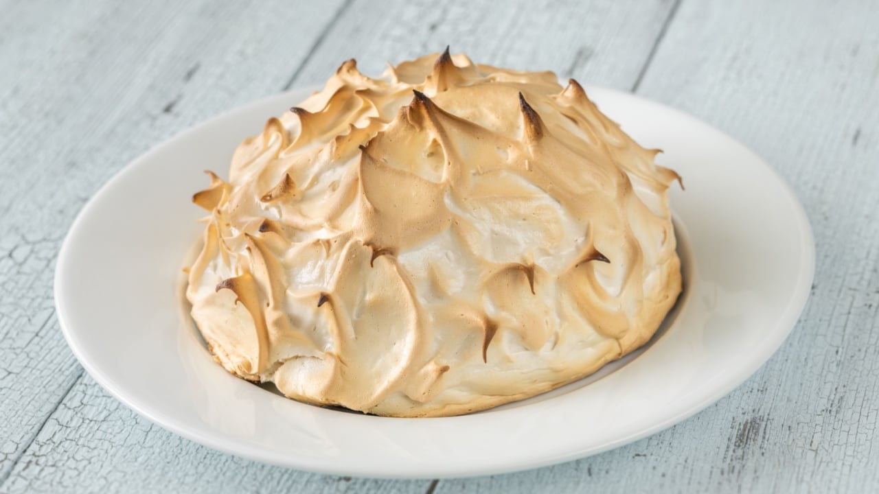 Baked Alaska dessert consisting of ice cream and browned meringue