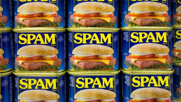 Spam tinned meat on grocery store shelf at a grocery supermarket.