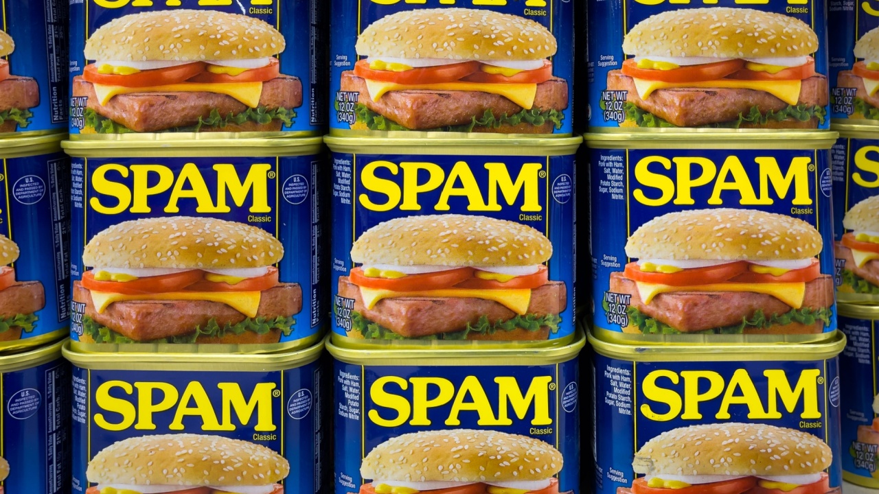 Spam tinned meat on grocery store shelf at a grocery supermarket.