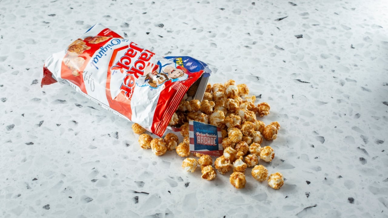 Los Angeles, California, United States - 08-14-2024: A view of a pile of Cracker Jack popcorn spilling out of the bag.