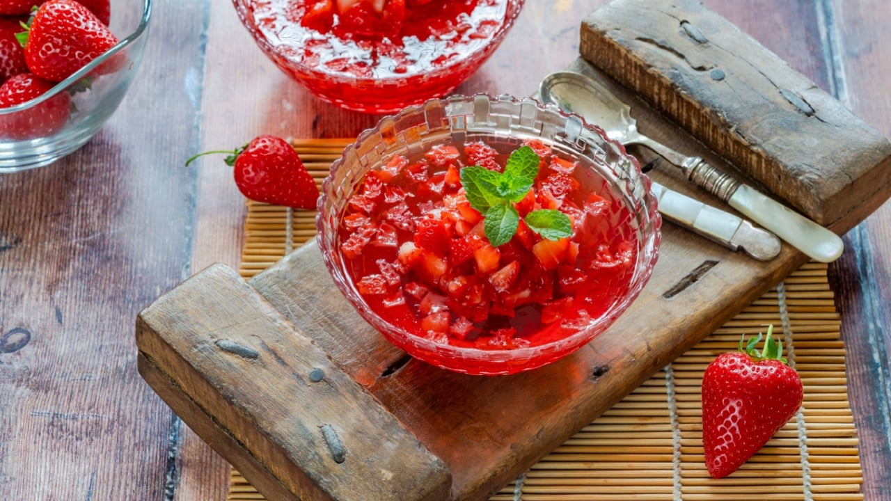 Homemade fruit jelly with fresh strawberries